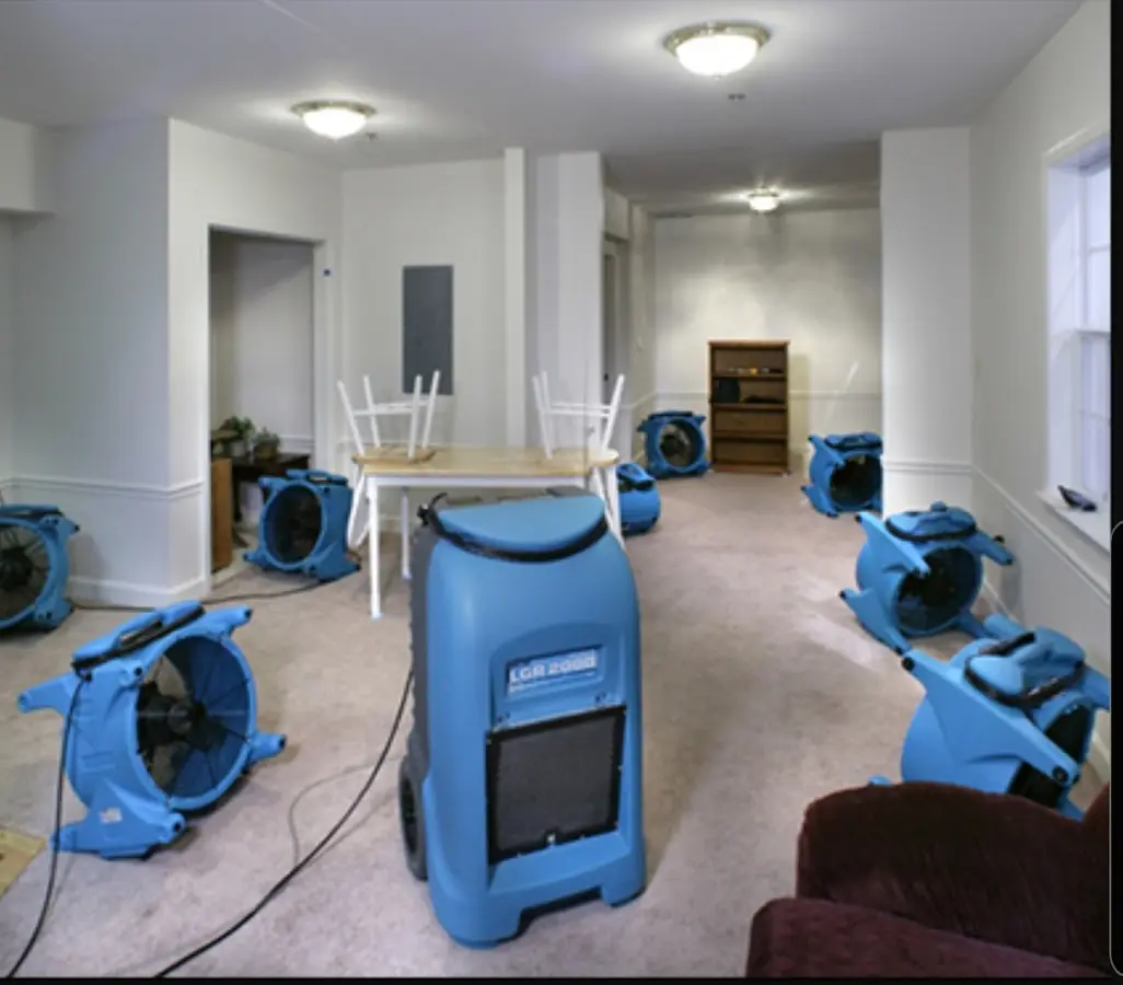 Air movers and dehumidifier setup for Water Damage Restoration in Hillside